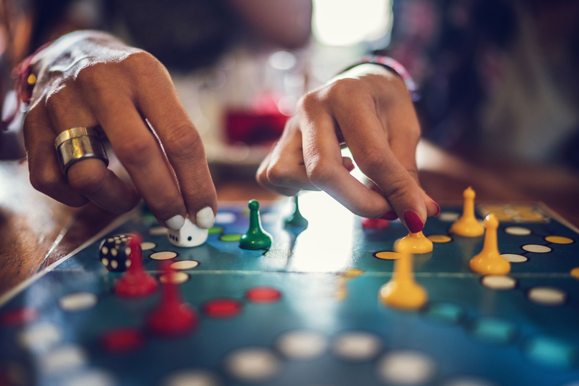 Close up of people playing cross and circle game.